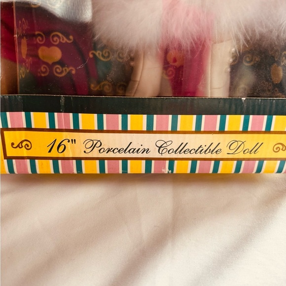 IC COLLECTION Porcelain Doll in Red Coat - Picture 2 of 4